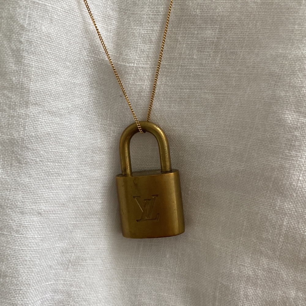Authentic Louis Vuitton locket on a chain
